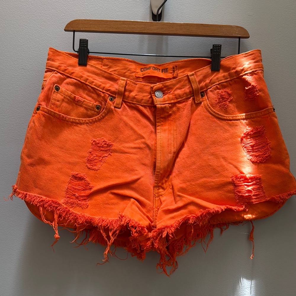Orange Levi’s distressed cutoff denim short Urban Outfitters Urban Renewal 33